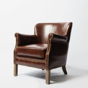 A classic brown leather armchair with wooden legs on a white background, ideal for stylish interiors.